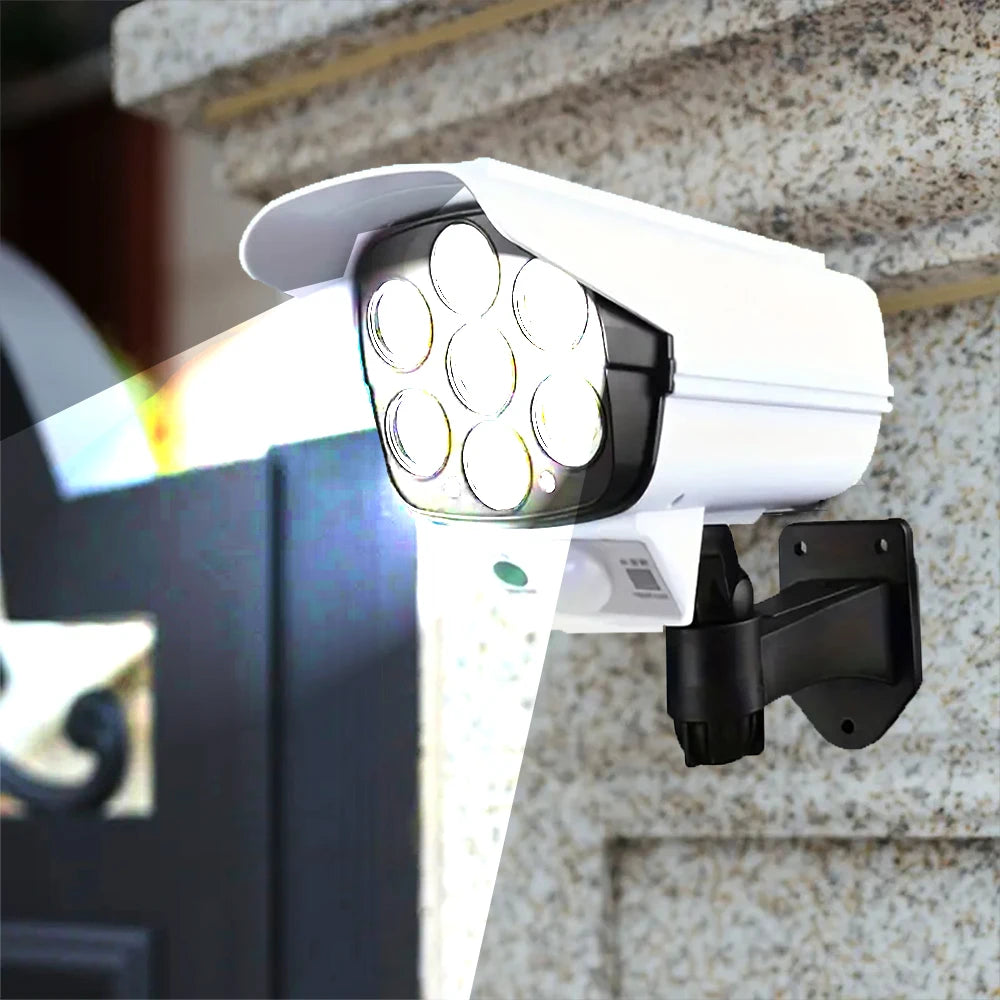 Luces solares para exteriores con Sensor de movimiento, reflectores con control remoto, cámara de seguridad falsa inalámbrica de 77LED para decoración de jardín